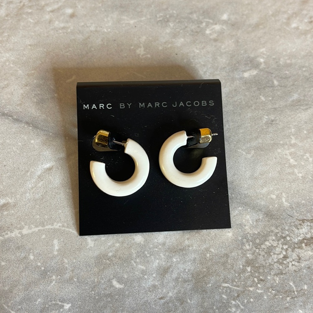White Donut Earrings by Marc Jacobs